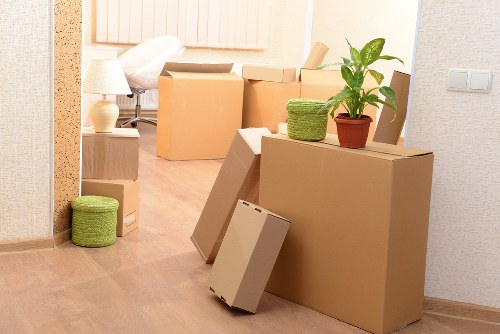 Family packing items for household storage in Earlscourt